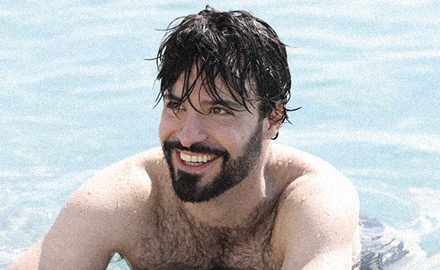 Stefano, man in pool with CNC hair prosthesis